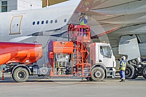 Refueling airplane, aircraft maintenance fuel at the airport.