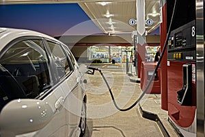 Refueling Automobile At Gas Station Convenience Store