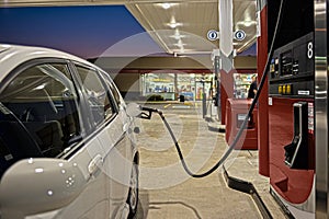 Refueling Automobile At Gas Station Convenience Store photo