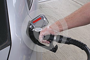 Refueling a car with diesel or petrol