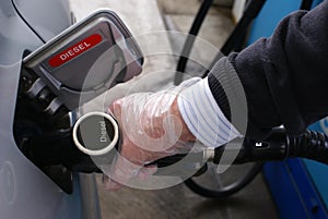Refueling a car with diesel in service or petrol station