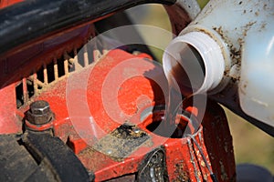 Refueling Chainsaw Close Up