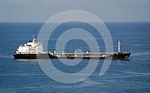 Refueling tanker anchored in port