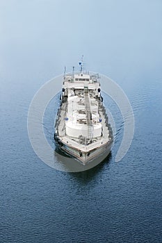 Refuelling tanker for ship and boat