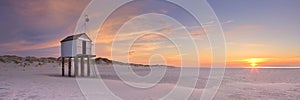 Refuge hut on Terschelling in The Netherlands at sunset