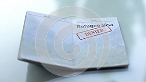 Refugee visa denied, seal stamped in passport, customs office, travelling