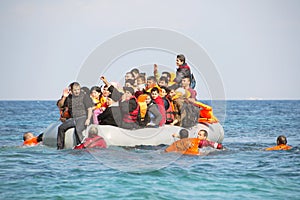 Refugees arriving in Greece in dinghy boat from Turkey.