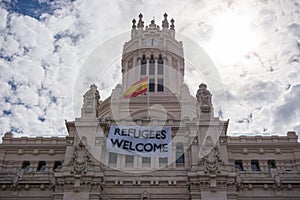 Refugees Welcome placard
