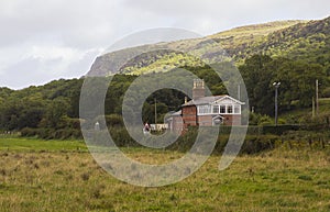 The refurbished automatic rail crossing and station house at Magilligan on the North coast of Ireland in County Londonderry