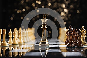 Regal gold chess king faces off against silver adversary strategically