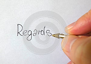 Regards Writing Hand