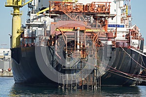 regasifier ship LNG Liquified Natural Gas tanker anchored in Genoa Harbor, Italy