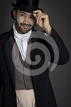 A Regency gentleman wearing a top hat against a grey backdrop