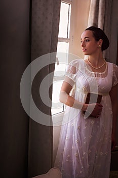 Regency lady at her window