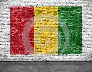 Reggae flag painted on brick wall