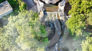 Reggia di Caserta, Italy. Aerial view of famous royal building gardens and waterfalls from a drone in summer season