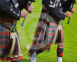 Regimental bagpipe players