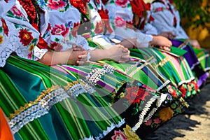 Regional, folklore costumes, colorful handmade skirts and shirts.