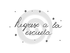 Regreso a la escuela phrase handwritten with a calligraphy brush. Back to school in spanish. Modern brush calligraphy. Isolated