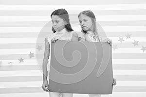 Regret to inform you. Girls hold advertisement poster copy space. Children hold advertising banner. Sad kids with blank