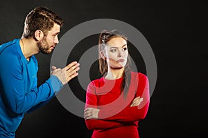 Regretful man husband apologizing upset woman wife