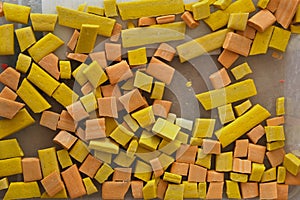 Regular or irregular pieces of colored stone or ceramic known as smalt for decorative art mosaic, close-up. Mosaico hobby. photo