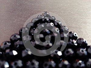 Black triangular beads
