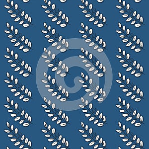 Regular vertical rows of leaves on blue background