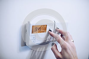 Regulating temperature on modern home heating control panel