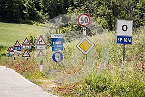 Regulation by many different road signs along the road