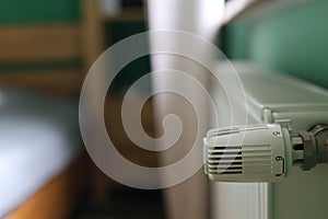 Regulator of heating system radiator in the bedroom