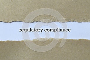 Regulatory compliance word on paper