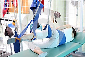 Rehabilitation exercises after spinal injury.