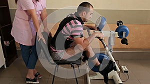 Rehabilitation for man with a broken back.