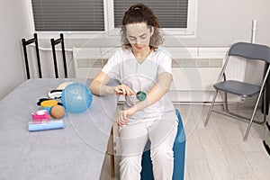 Rehabilitation Specialist, Physical Therapist With Rehab Tools, Foam Roller,Massage Ball