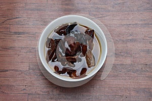 Rehydrated wood ear mushrooms in white bowl, delicacy of Sikkim