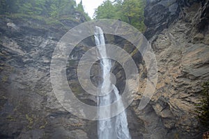 The Reichenbach Falls are a beautiful waterfall in Meiringen, background