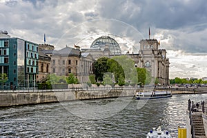 Reichstag building and Spree river at sunset, Berlin, Germany