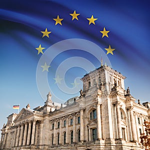 Reichstag (Bundestag) building in Berlin with flag on background - EU