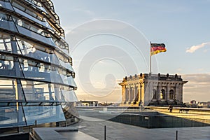 Reichstag glass dome of the Parliament in Berlin (Bundestag) with German flag