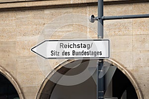 Reichstag and Sitz des Bundestages Sign in Berlin photo