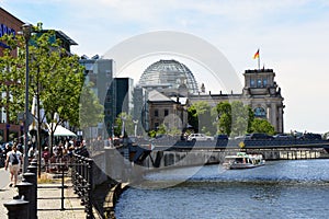 Reichstagufer street with MarschallbrÃÂ¼cke bridge and the Reichstag on the background with is glass dome, Berlin, Germany