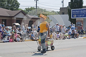 Reiland Trucking Guy in Cheesehead close up at parade
