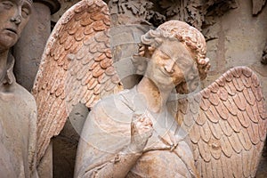 Reims, France - The Smiling Angel Statue on the Entrance Outside the Reims Cathedral