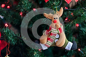 Reindeer decoration on a christmas tree.