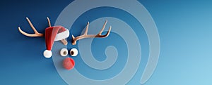 Reindeer with red nose and Santa hat on blue Christmas background