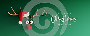Reindeer with red nose and Santa hat on green Christmas background