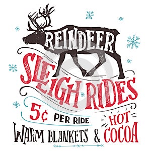 Reindeer sleigh rides signboard photo