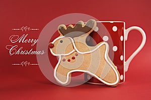 Reindeer vanilla cookie biscuit with red polka dot cup of coffee