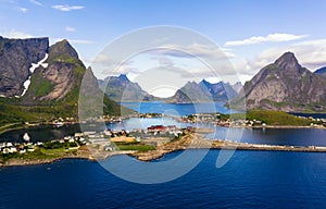 Reine fishing village surrounded by high mountains and fjords on Lofoten islands